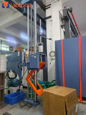 Testador profissional de queda em laboratório para superfícies, teste de queda em cantos e bordas de acordo com os padrões industriais